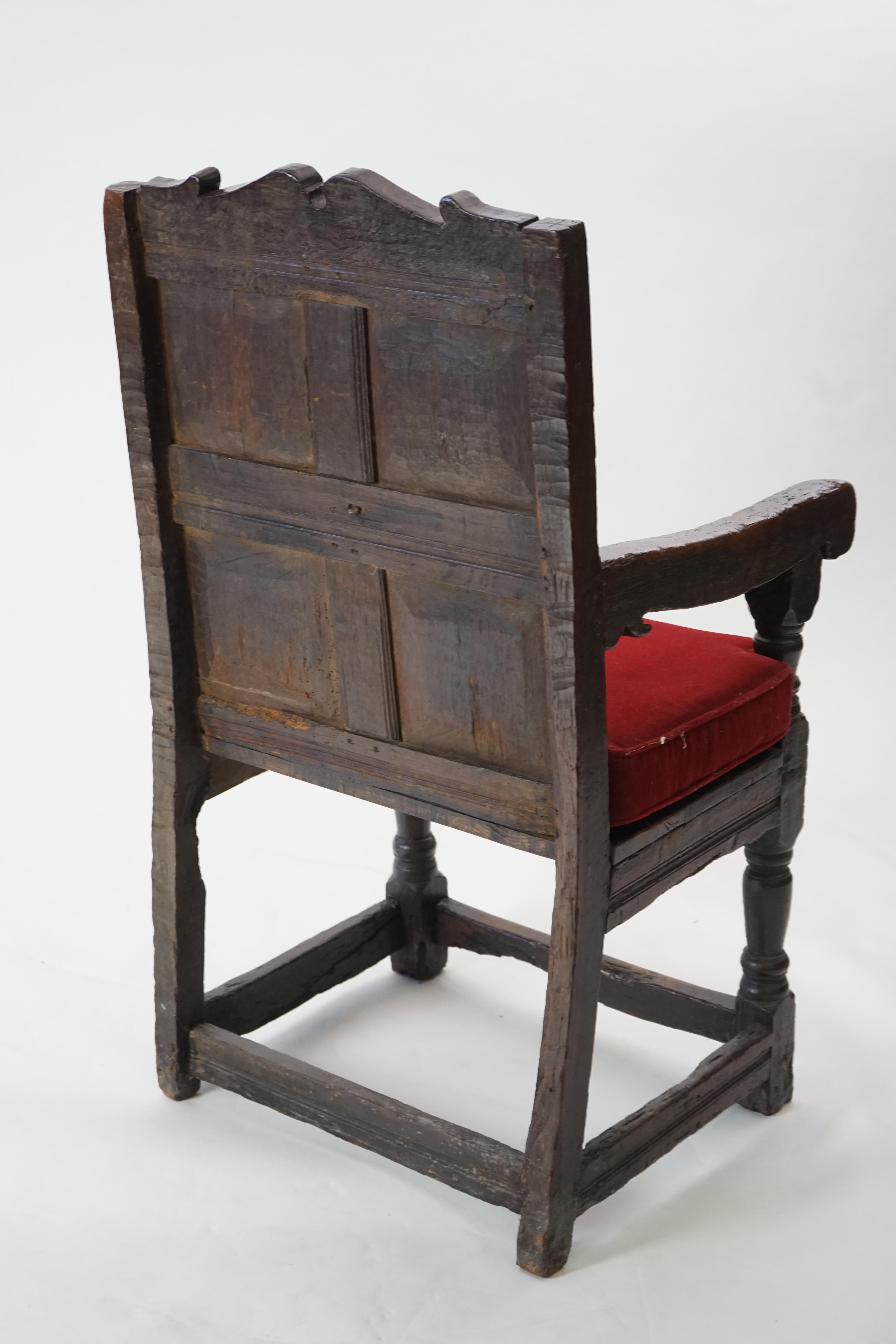 A 17th century and later oak Wainscot elbow chair